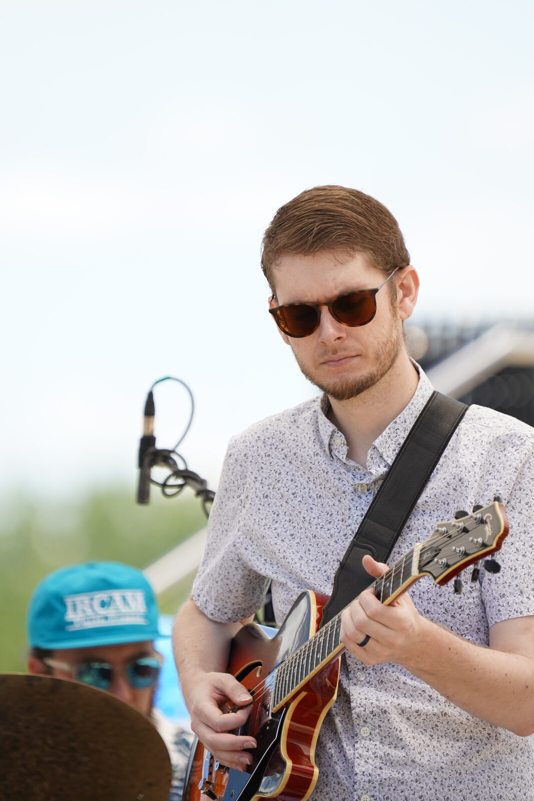 Trioblique performing live — lead guitar